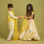 Beaded Yellow Top And Shibori Printed Lehenga With Ruffle Dupatta twinning model image 1