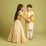 Beaded Yellow Top And Shibori Printed Lehenga With Ruffle Dupatta twinning model image 2
