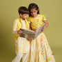Beaded Yellow Top And Shibori Printed Lehenga With Ruffle Dupatta twinning model image 3