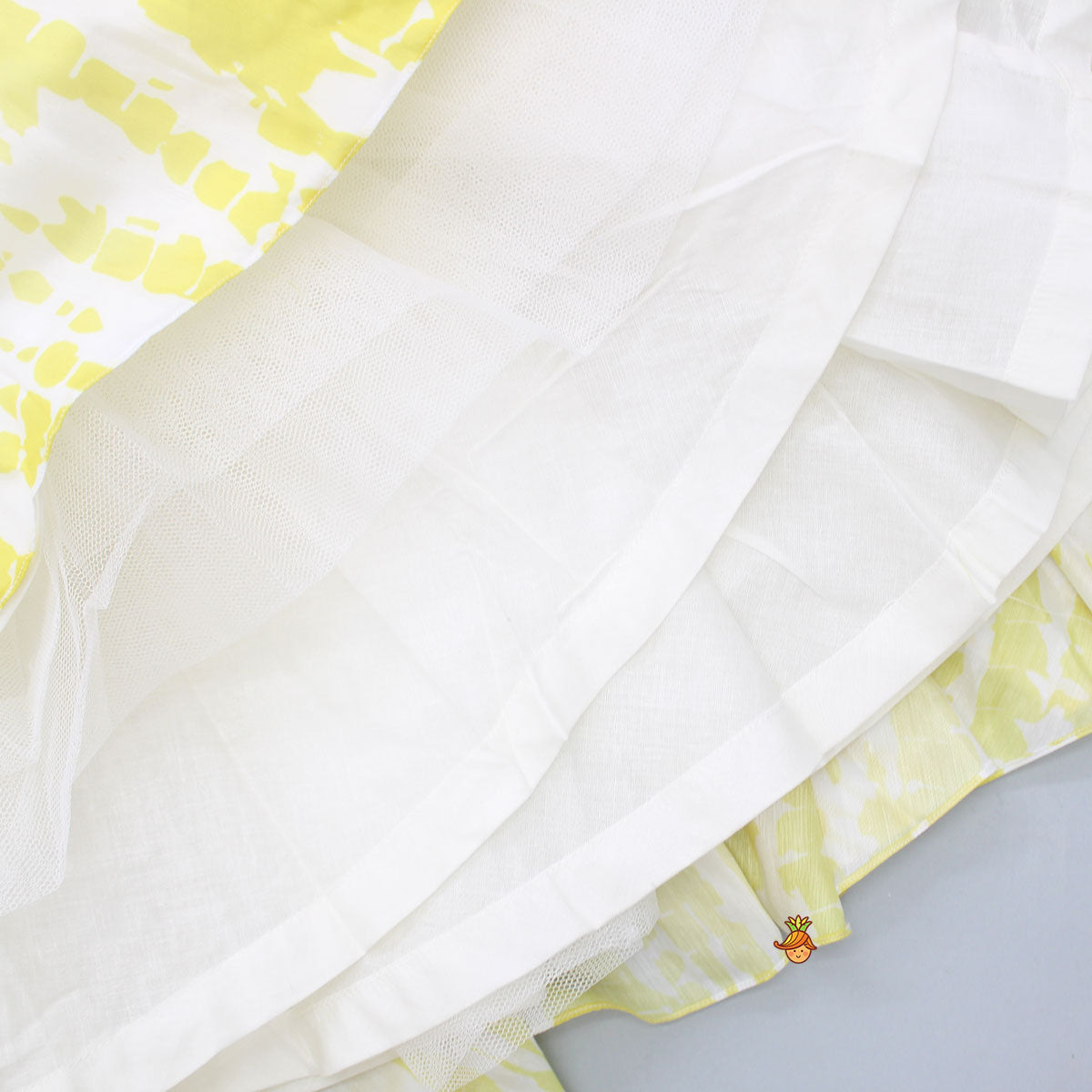 Beaded Yellow Top And Shibori Printed Lehenga With Ruffle Dupatta