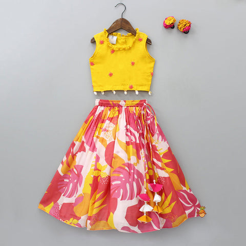 Pre Order: Round Neck Yellow Top And Printed Multicolour Lehenga With Floral Hair Ties