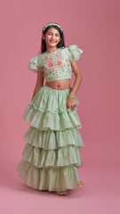 Pre Order: Green Floral Thread Embroidered Top With Multi Layered Ruffle Lehenga