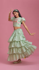 Pre Order: Green Floral Thread Embroidered Top With Multi Layered Ruffle Lehenga