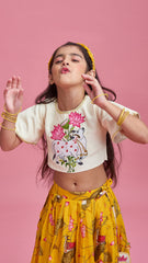 Pre Order: Off White Cow Embroidered Top With Pleated Yellow Lehenga
