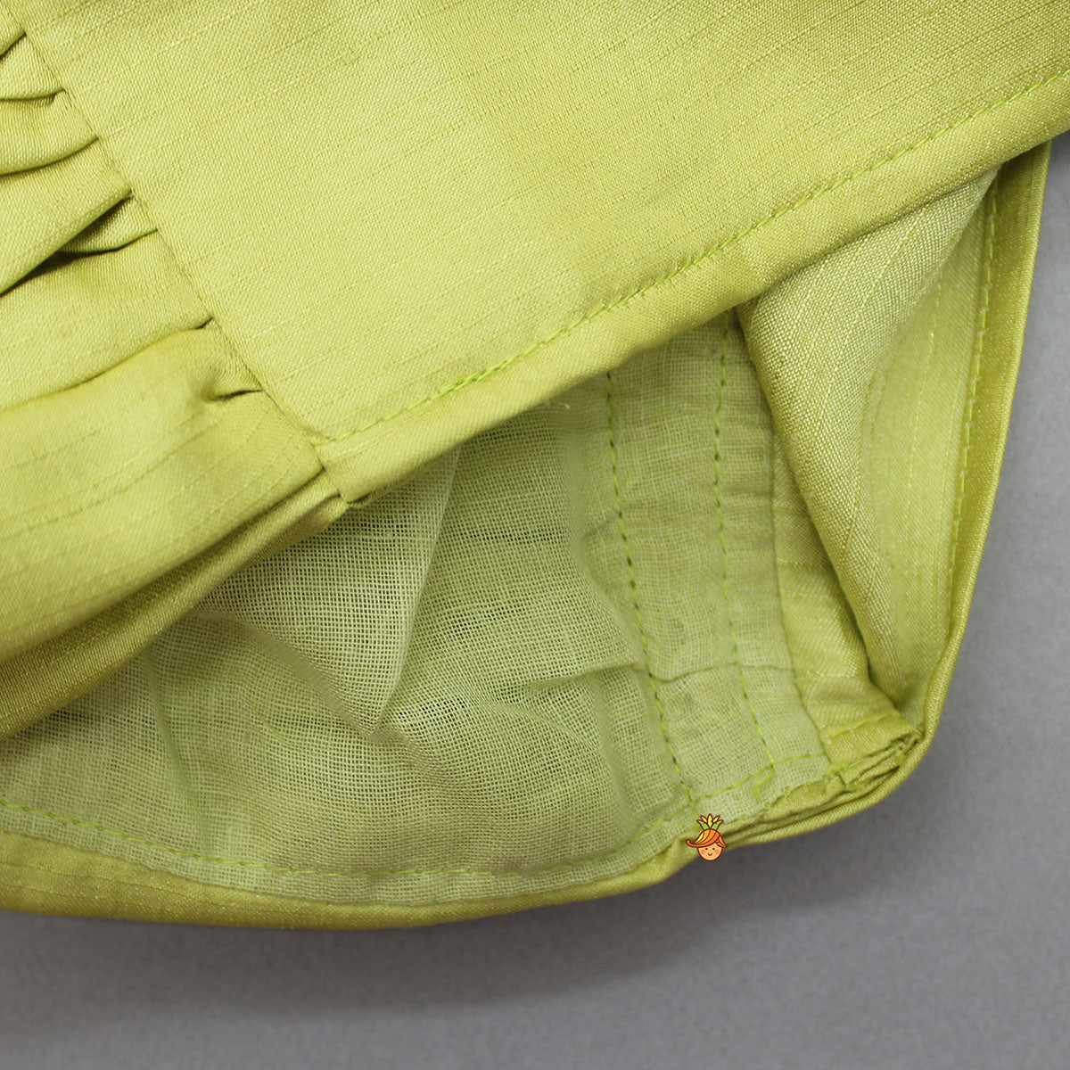 Back Knot Detail Stylish Green Floral Top And Heavy Sequins Embroidered Lehenga With Bow Hair Clip