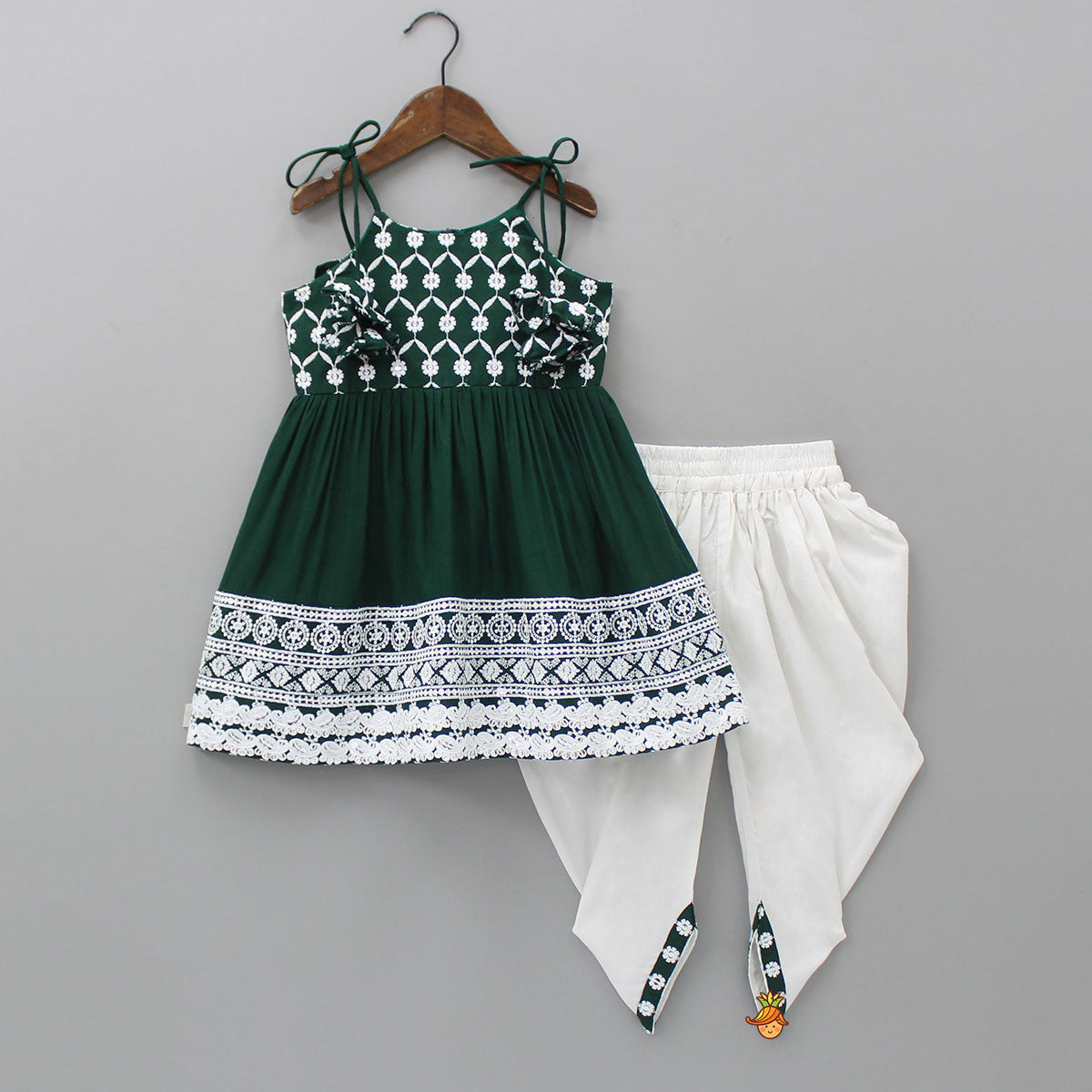 Pre Order: Intricate Floral Thread Embroidered Green Kurti And Dhoti