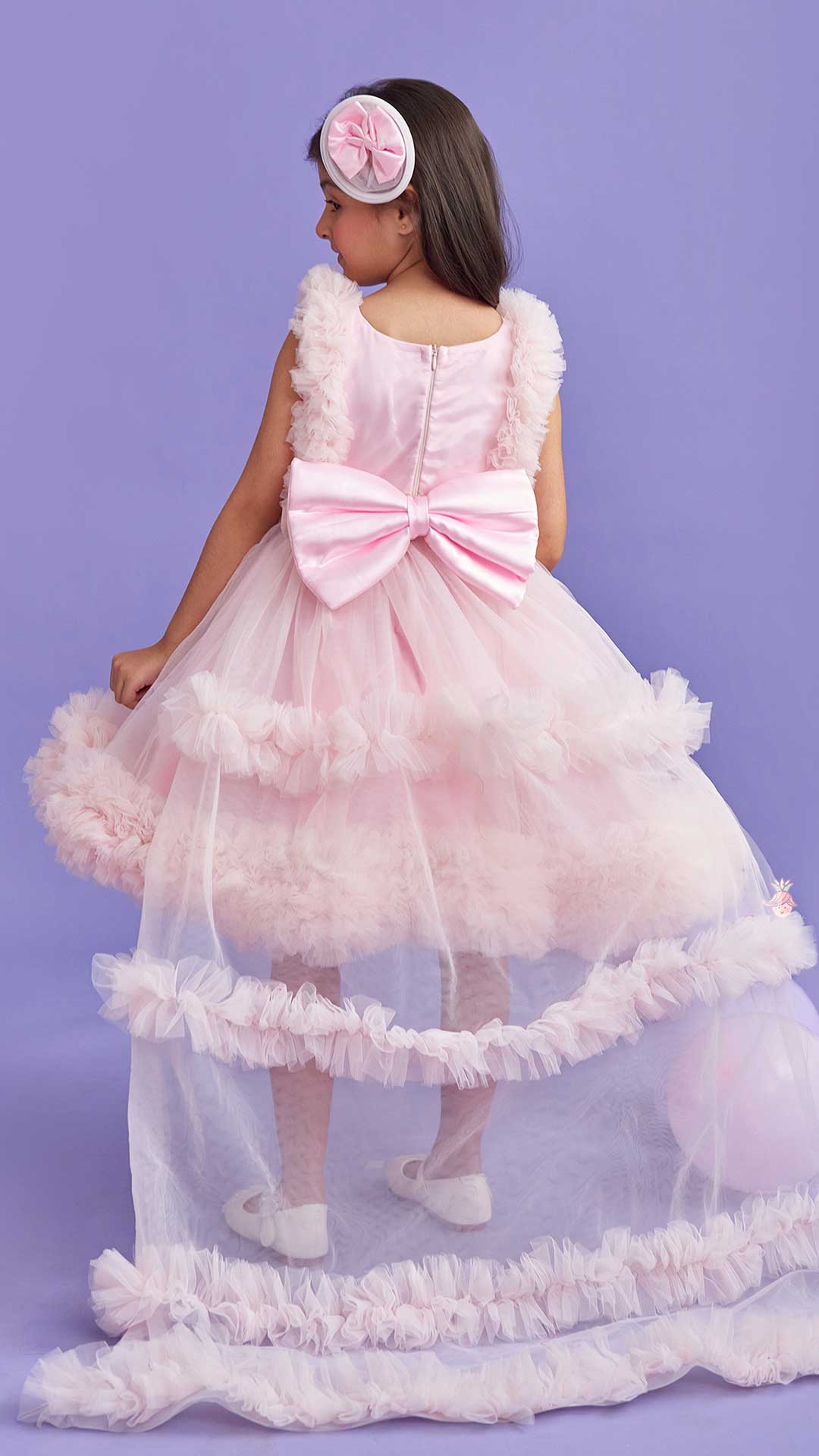 Pink Frilled Flared Dress With Detachable Bow And Trail With Head Band