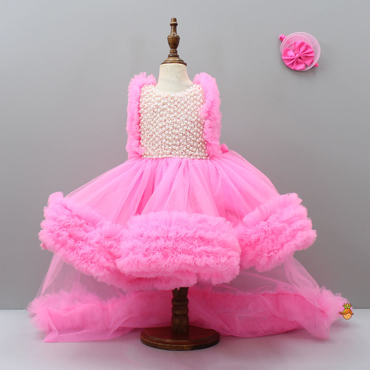 Glamorous Pink Frilled Dress With Detachable Trail And Head Band