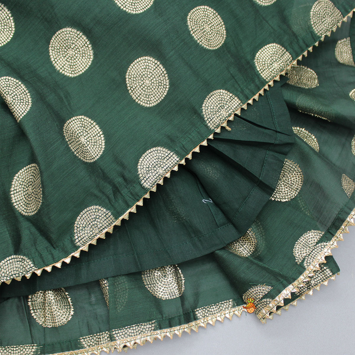 Embroidered Sleeveless Green Peplum Top And Lehenga