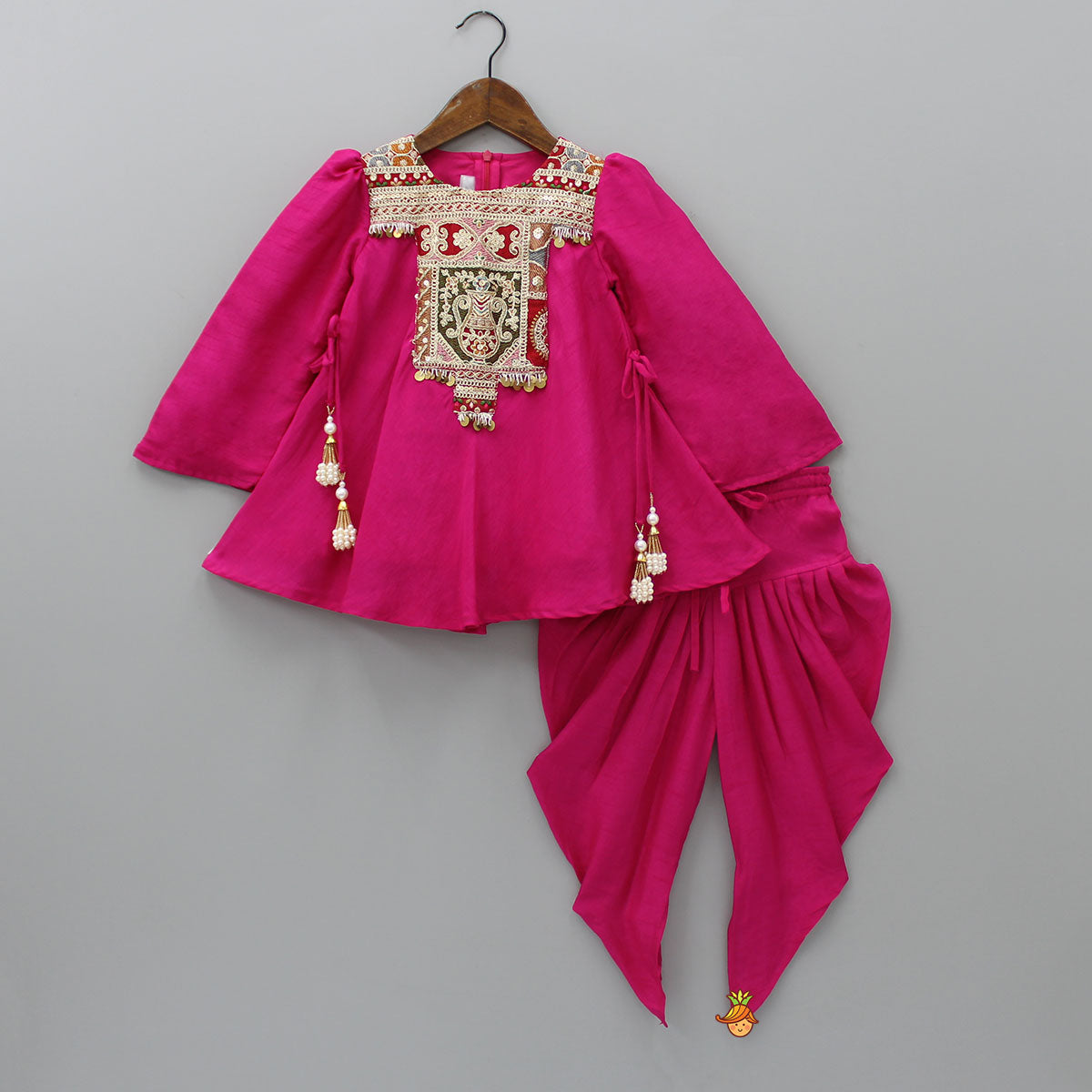 Pre Order: Embroidered Yoke Tassels Enhanced Pink Kurti And Dhoti