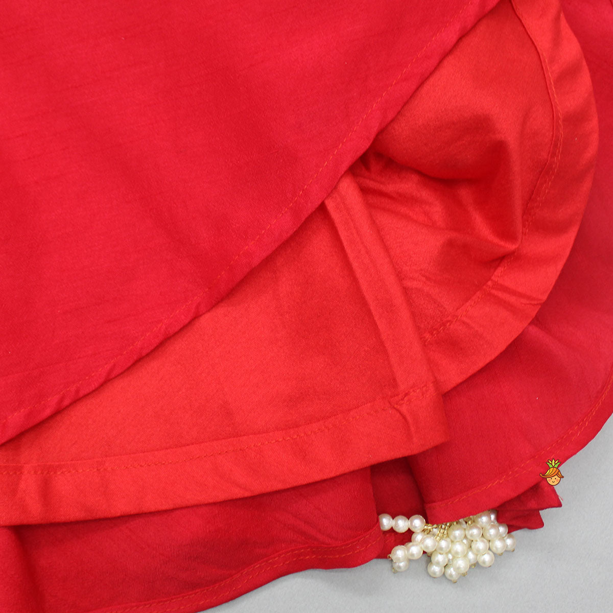 Embroidered Yoke Tassels Enhanced Red Kurti And Dhoti