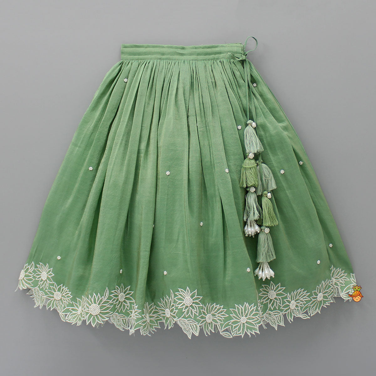 Pleated Neckline Green Top And Fringes Tassels Enhanced Lehenga