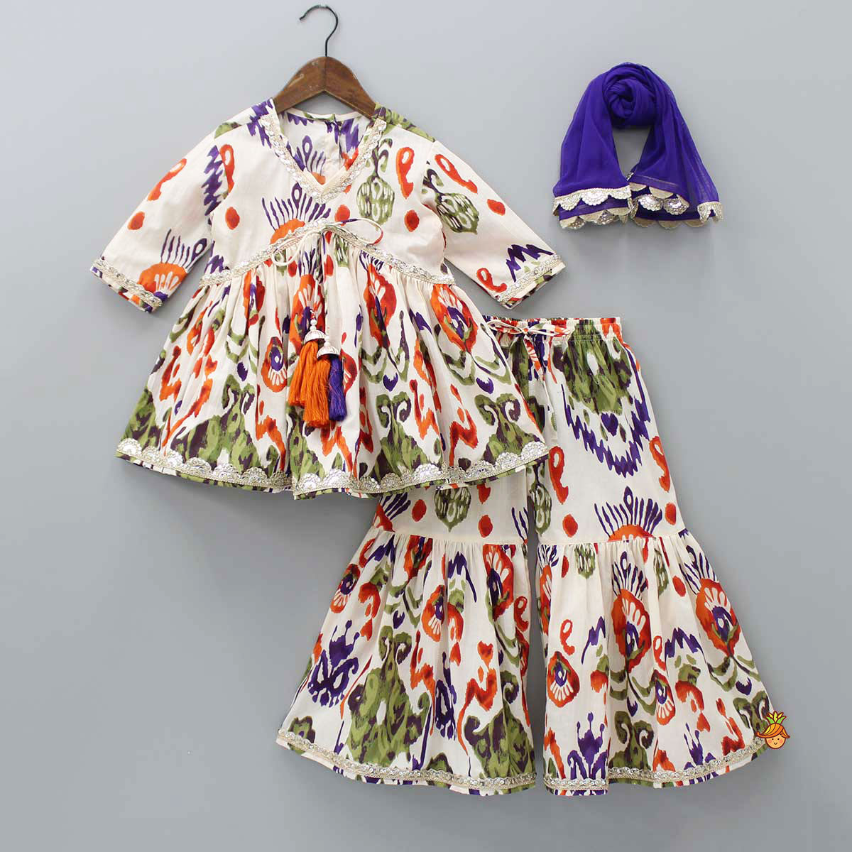 Tassels Enhanced Multicolour Printed Kurti And Sharara With Scalloped Lace Detail Lavender Dupatta