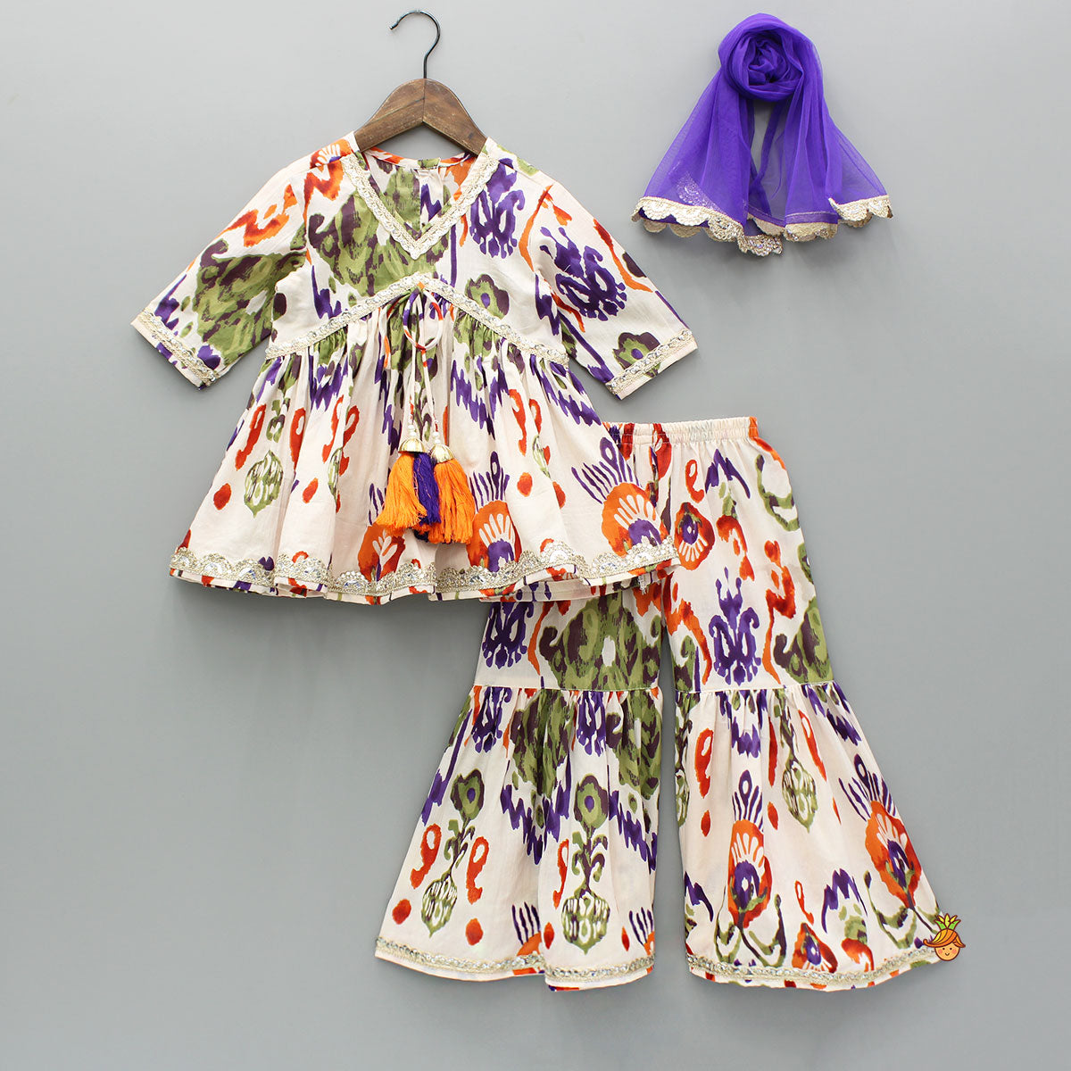 Tassels Enhanced Multicolour Printed Kurti And Sharara With Scalloped Lace Detail Dupatta