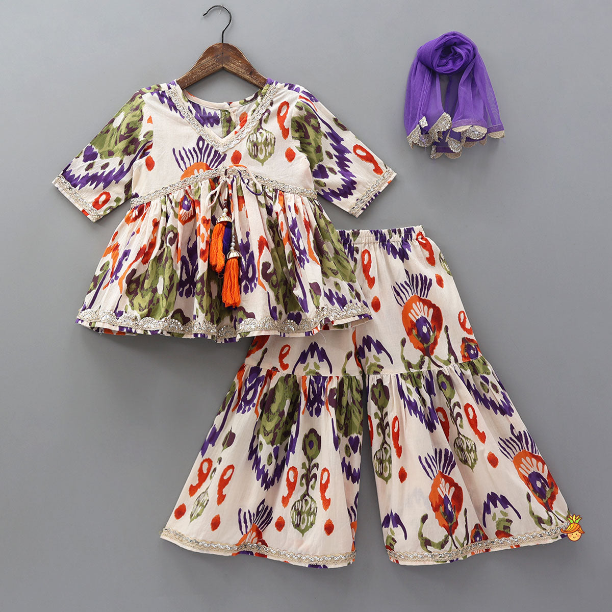 Tassels Enhanced Multicolour Printed Kurti And Sharara With Scalloped Lace Detail Dupatta