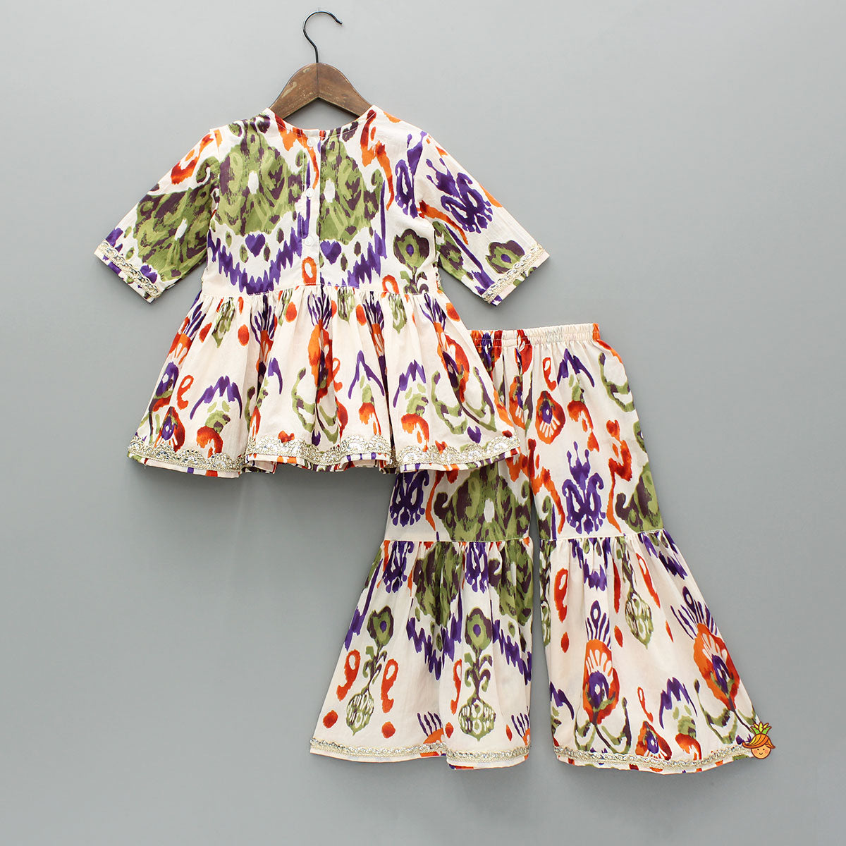 Tassels Enhanced Multicolour Printed Kurti And Sharara With Scalloped Lace Detail Dupatta