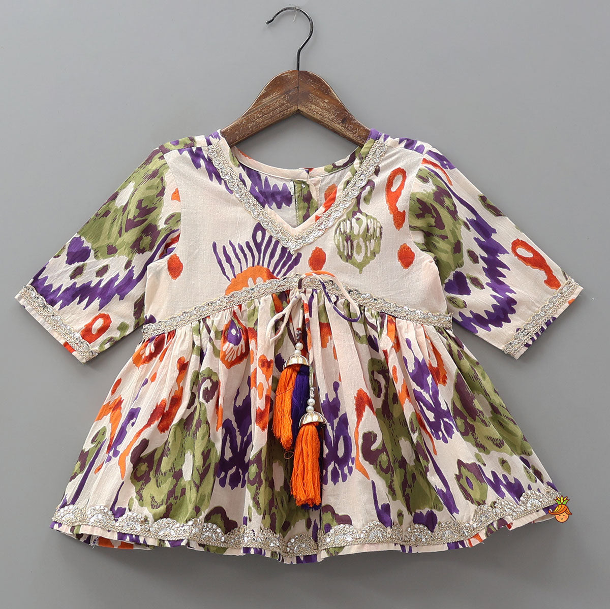 Tassels Enhanced Multicolour Printed Kurti And Sharara With Scalloped Lace Detail Dupatta