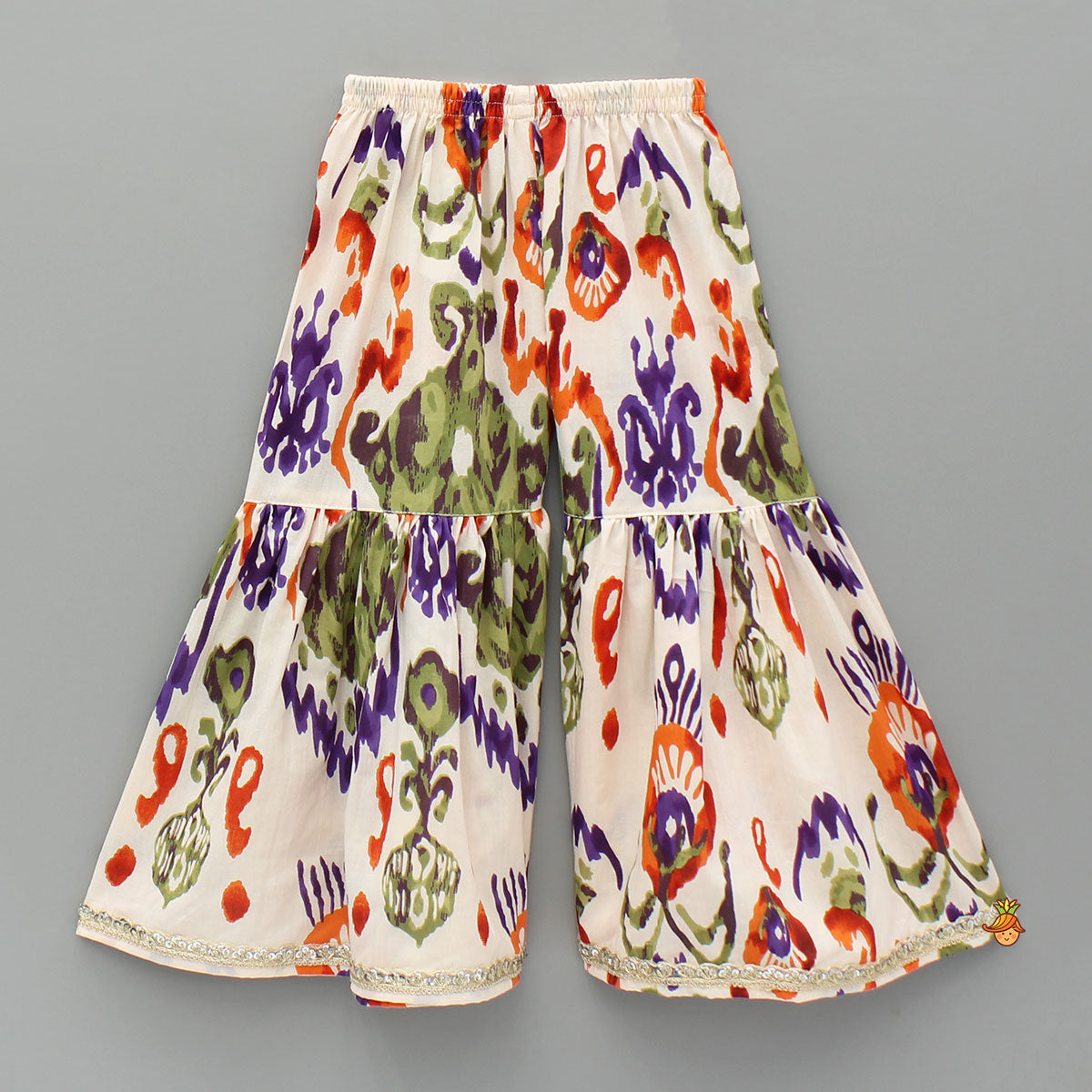 Tassels Enhanced Multicolour Printed Kurti And Sharara With Scalloped Lace Detail Dupatta