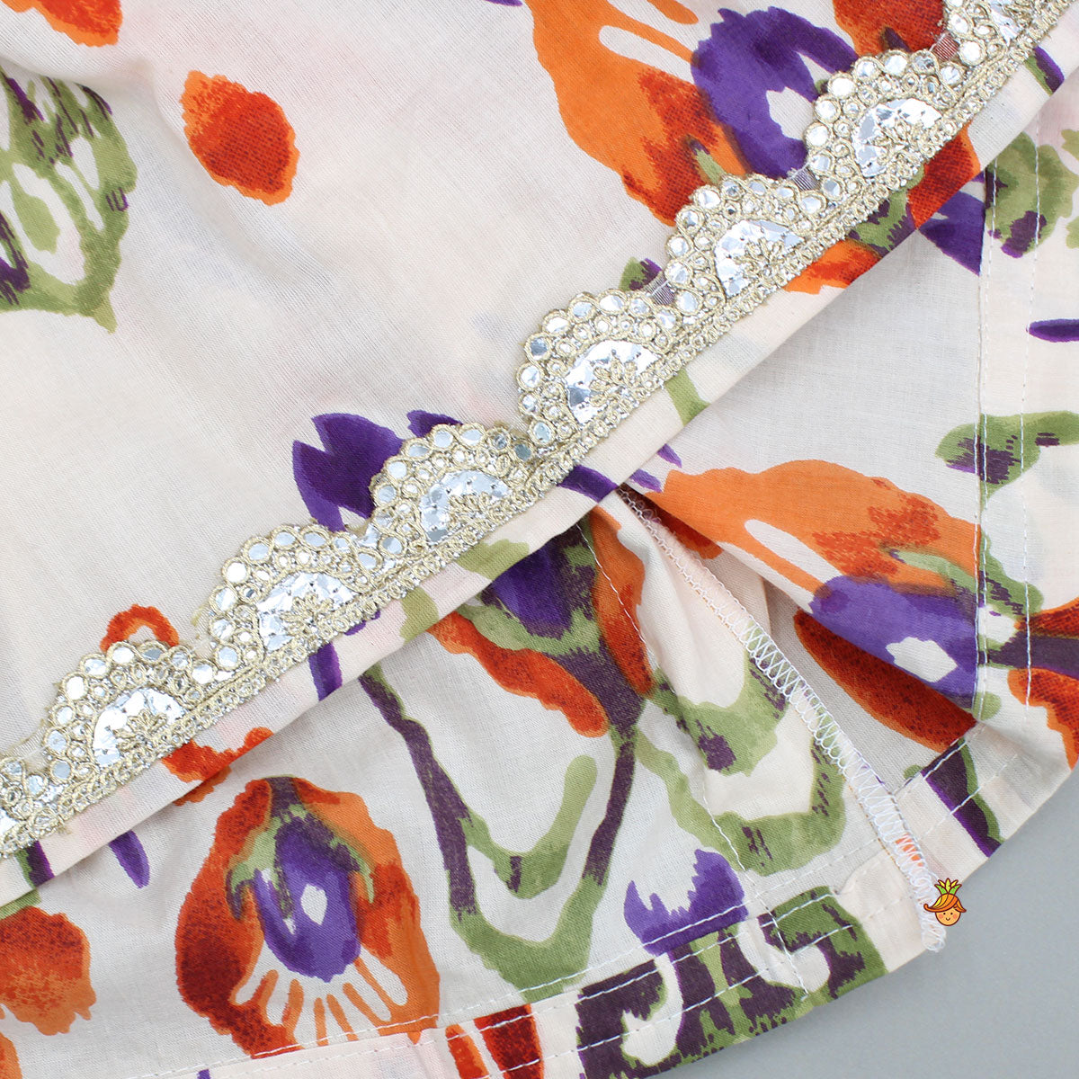 Tassels Enhanced Multicolour Printed Kurti And Sharara With Scalloped Lace Detail Dupatta