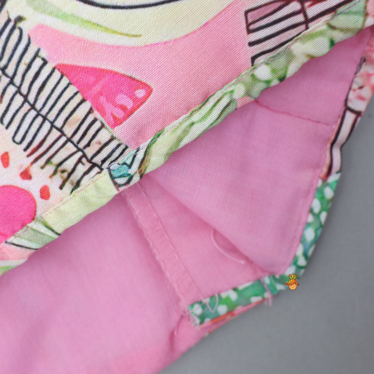 Buttons Adorned Pink Top And Scalloped Lace Work Floral Lehenga