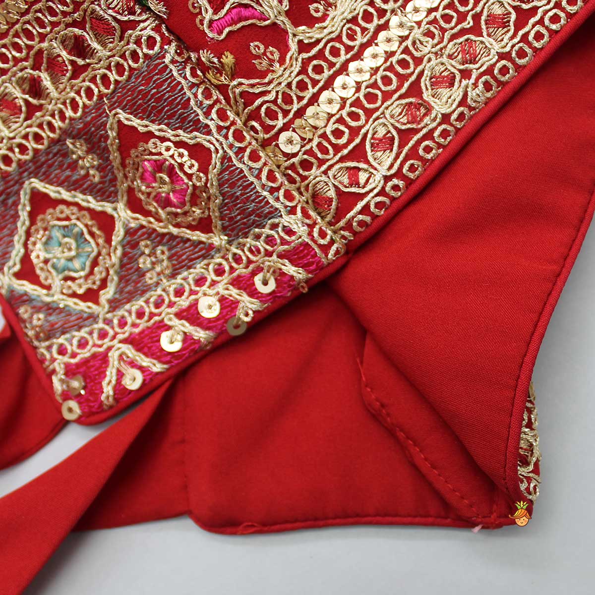 Back Knot Detail Beautiful Red Top And Lehenga With Matching Net Dupatta