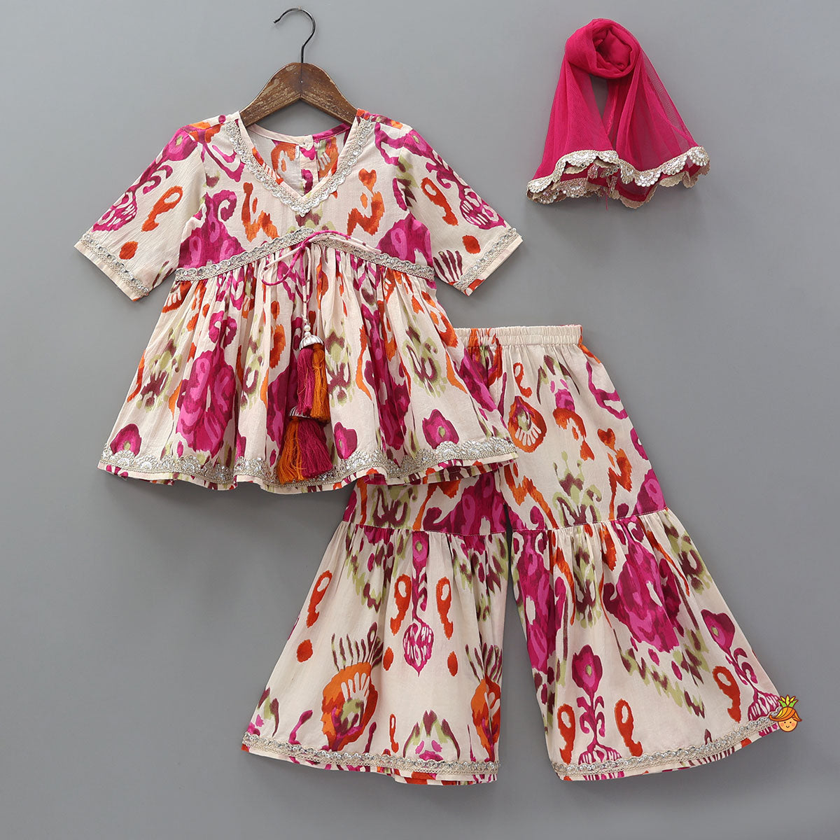 Tassels Enhanced Multicolour Printed Kurti And Sharara With Scalloped Lace Detail Dupatta