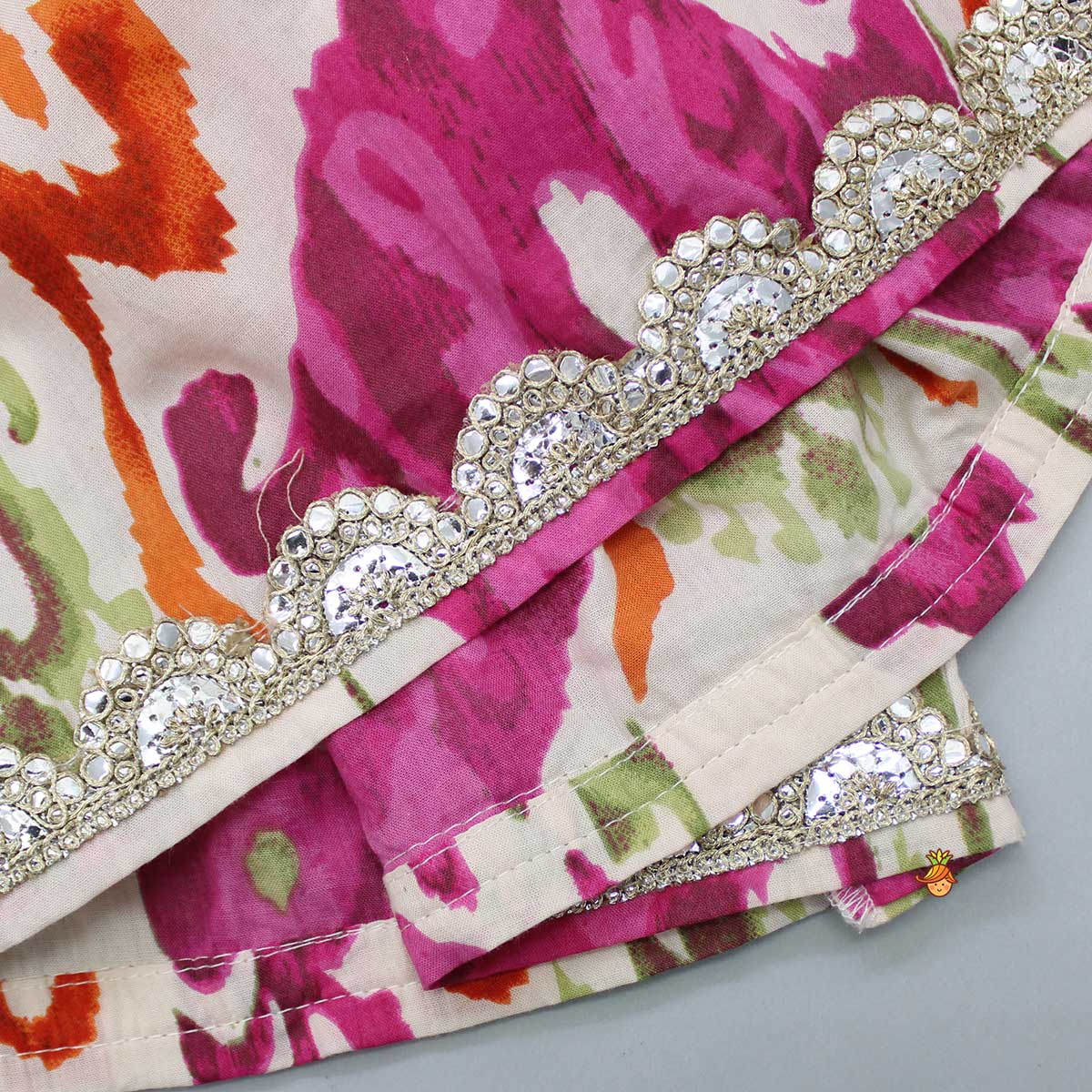 Tassels Enhanced Multicolour Printed Kurti And Sharara With Scalloped Lace Detail Pink Dupatta