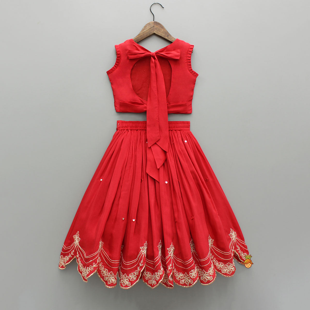 Dual Back Knot Detail Red Top And Tassels Enhanced Lehenga
