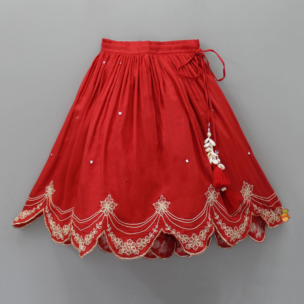 Dual Back Knot Detail Red Top And Tassels Enhanced Lehenga