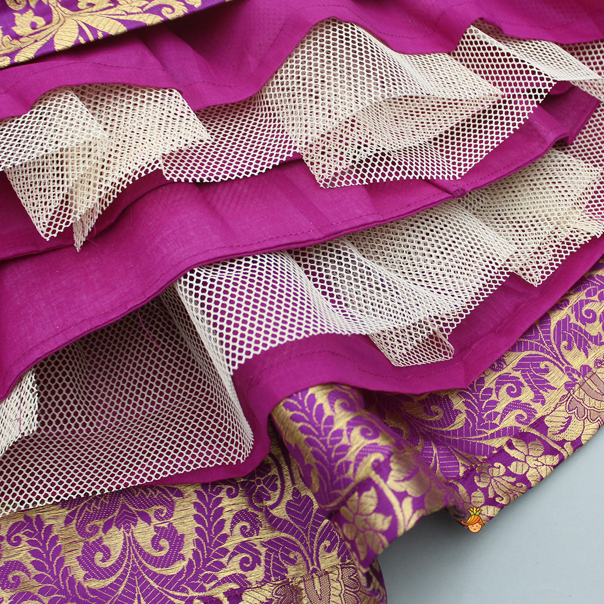 Stylish Cut Out Back Purple Top And Box Pleated Brocade Lehenga