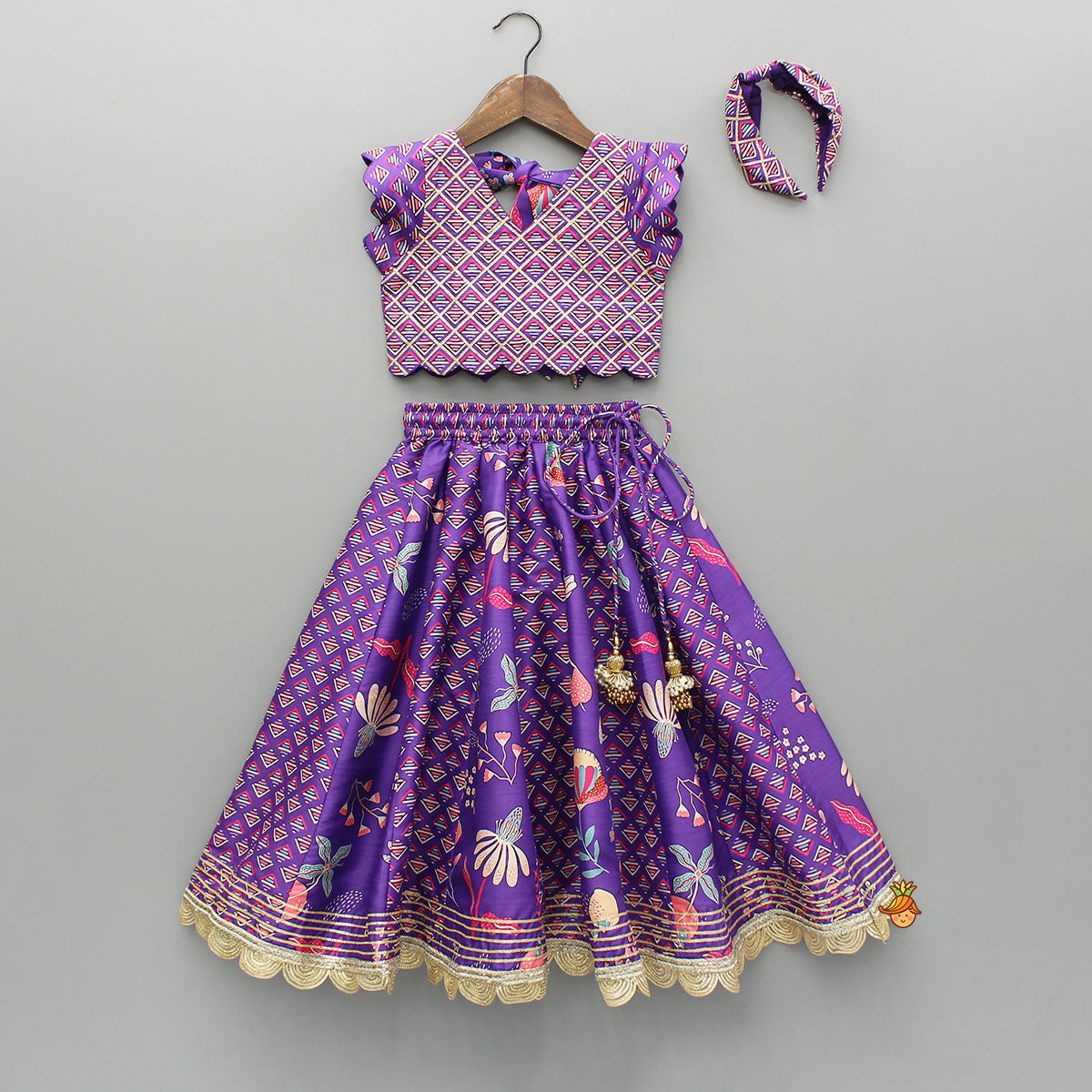 Scalloped Hem V Neck Purple Top And Lehenga With Matching Hair Band