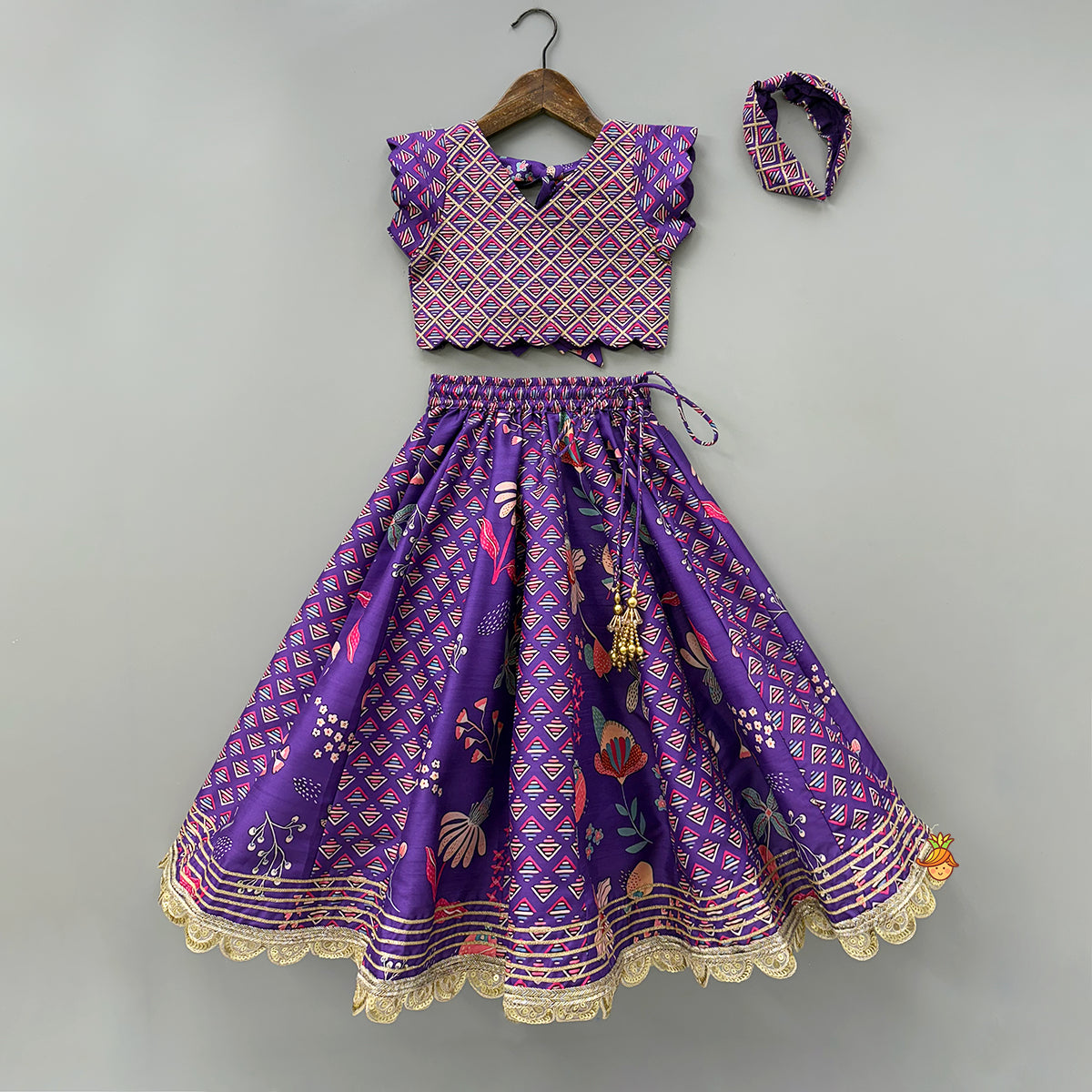 Scalloped Hem V Neck Purple Top And Lehenga With Matching Hair Band