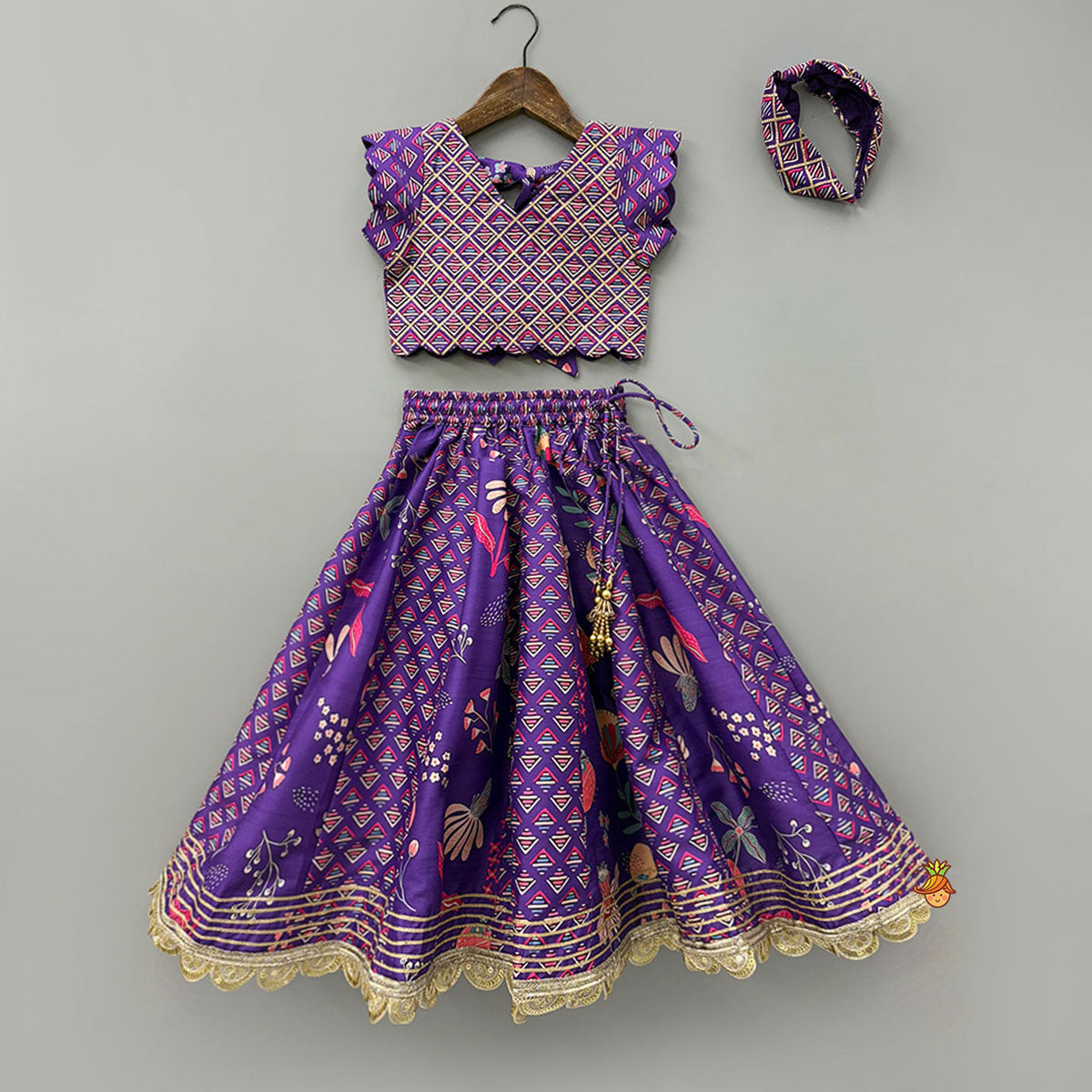 Scalloped Hem V Neck Purple Top And Lehenga With Matching Hair Band