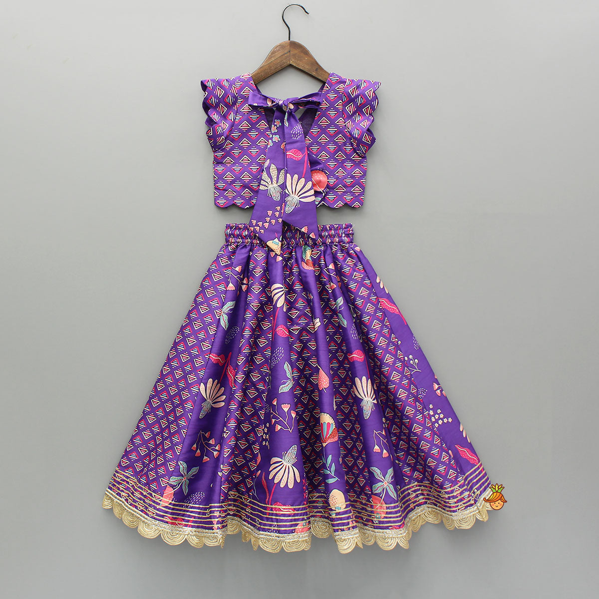 Scalloped Hem V Neck Purple Top And Lehenga With Matching Hair Band
