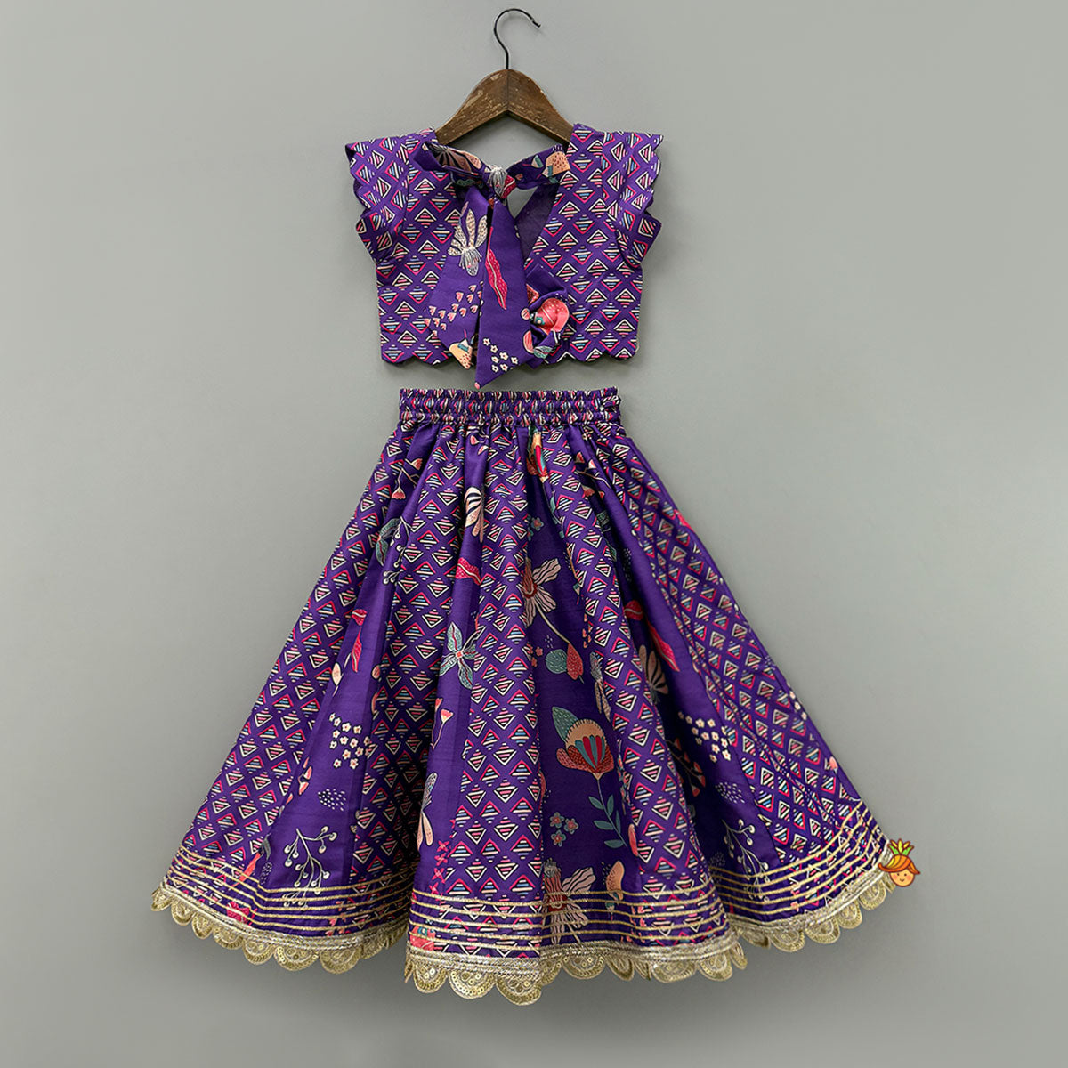 Scalloped Hem V Neck Purple Top And Lehenga With Matching Hair Band