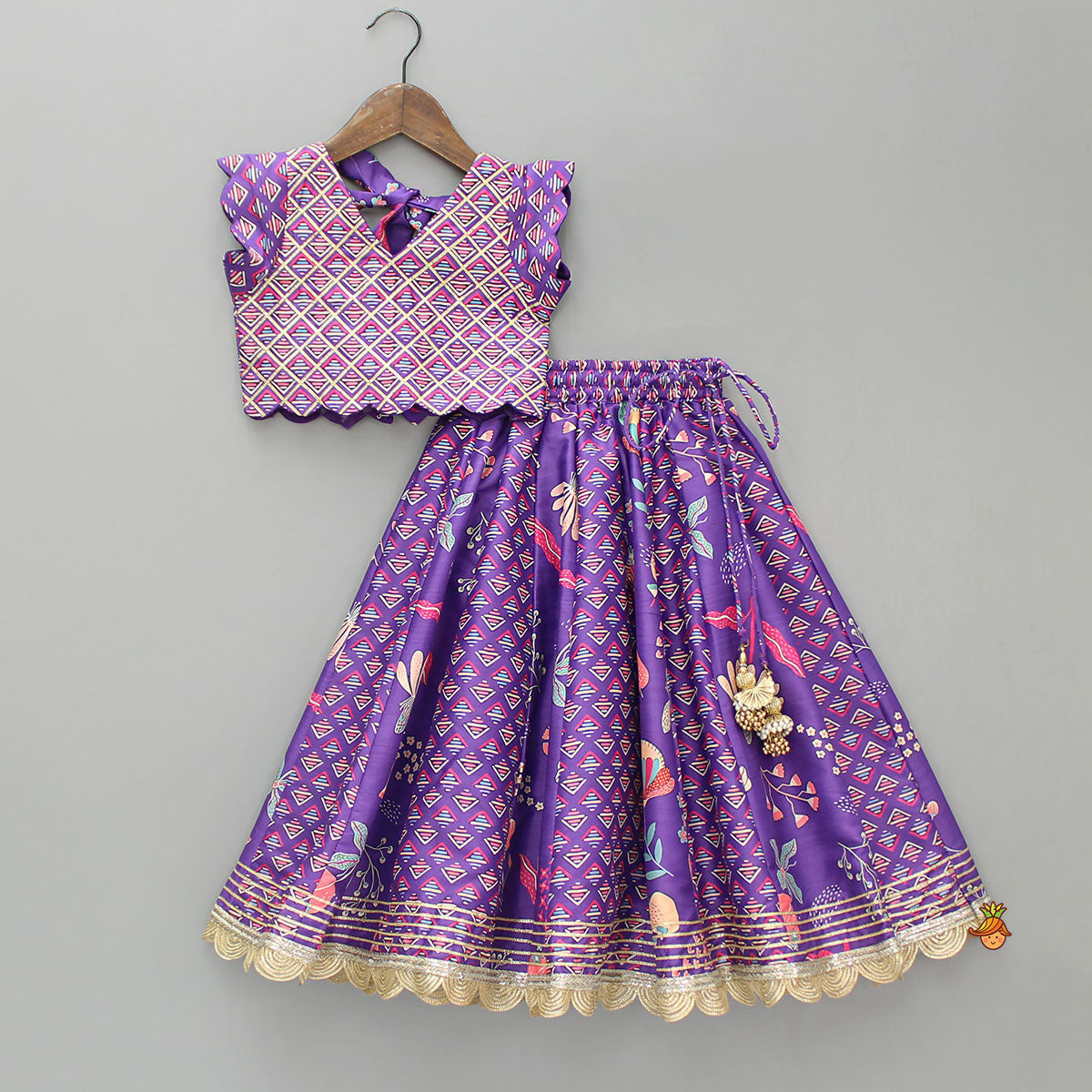 Scalloped Hem V Neck Purple Top And Lehenga With Matching Hair Band