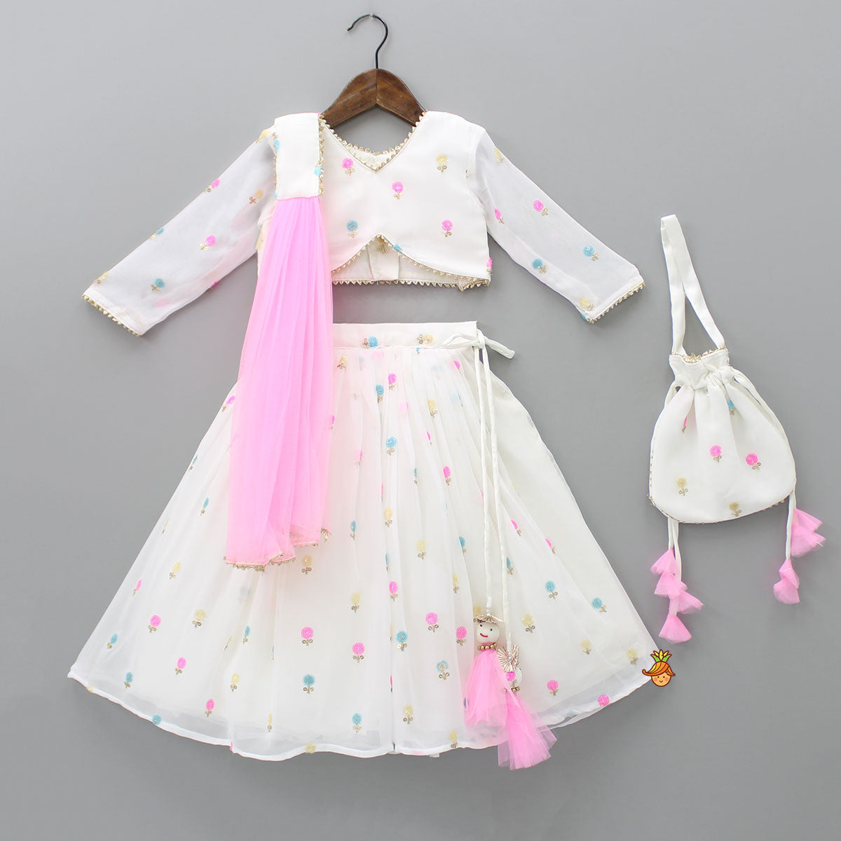 Embroidered Off-White Top And Lehenga With Contrasting Pink Net Dupatta And Potli Bag