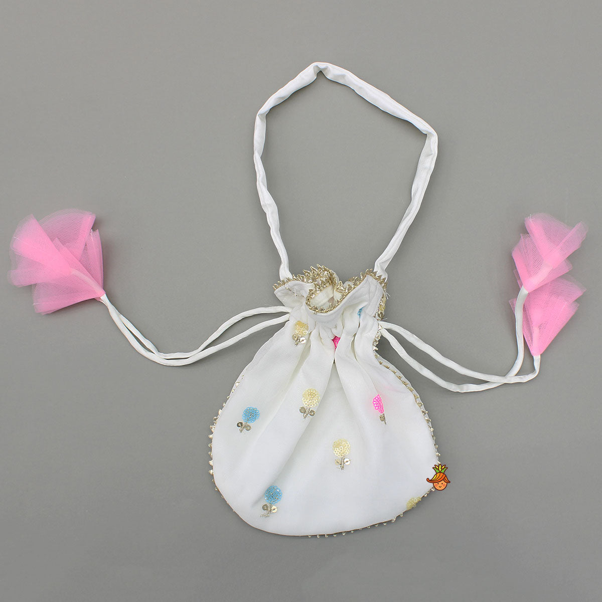 Embroidered Off-White Top And Lehenga With Contrasting Pink Net Dupatta And Potli Bag