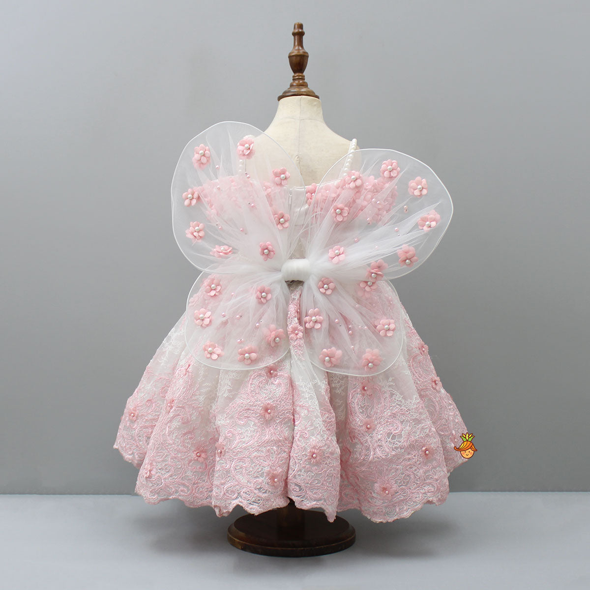Off Shoulder Fabric Flowers Adorned Wings Gown With Detachable Trail And Matching Hair Clip