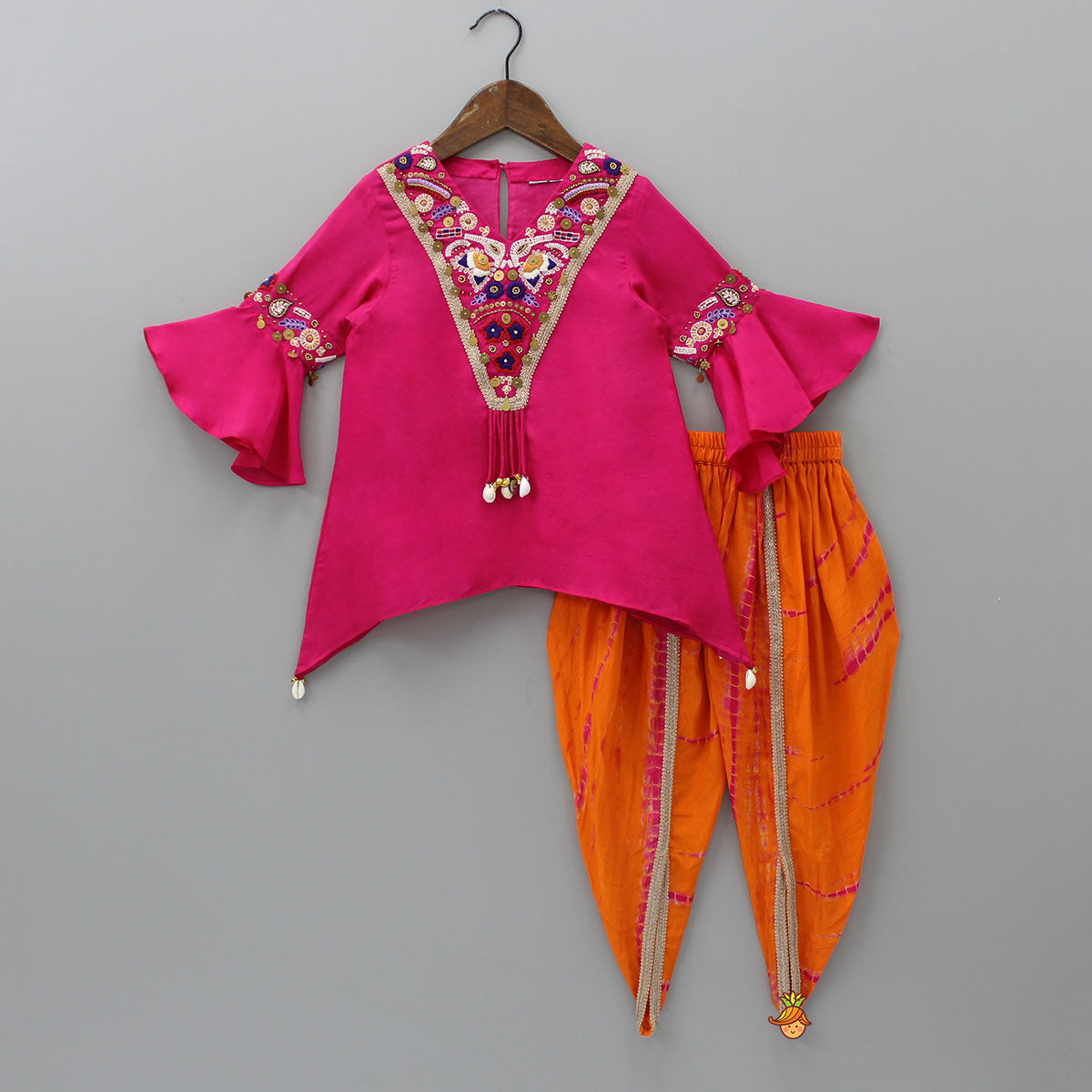 Pre Order: Hanging Tassels Enhanced Pink Top And Shibori Printed Dhoti