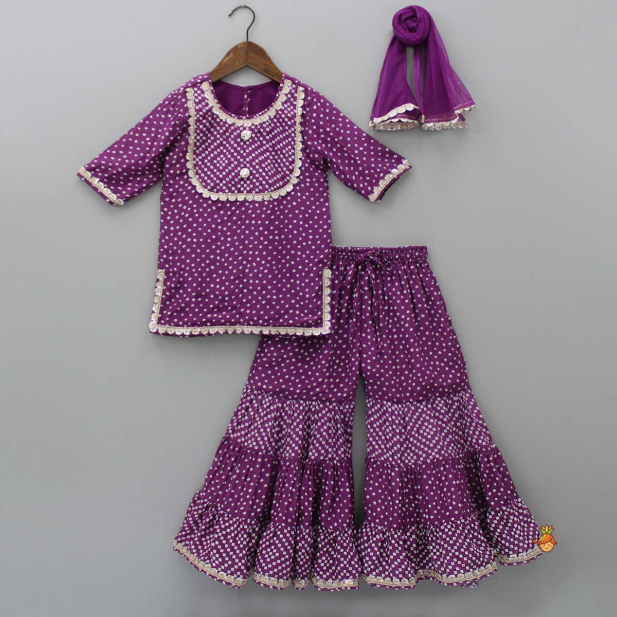 Purple Bandhani Printed Kurti And Tiered Sharara With Matching Net Dupatta