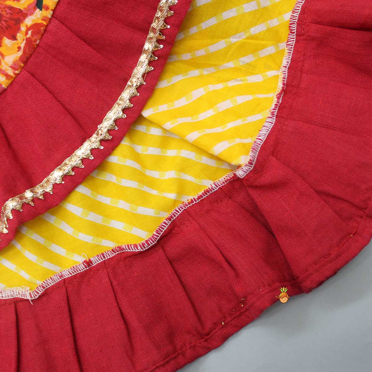 Thread-Embroidered Halter Neck Top And Multi-Printed Lehenga