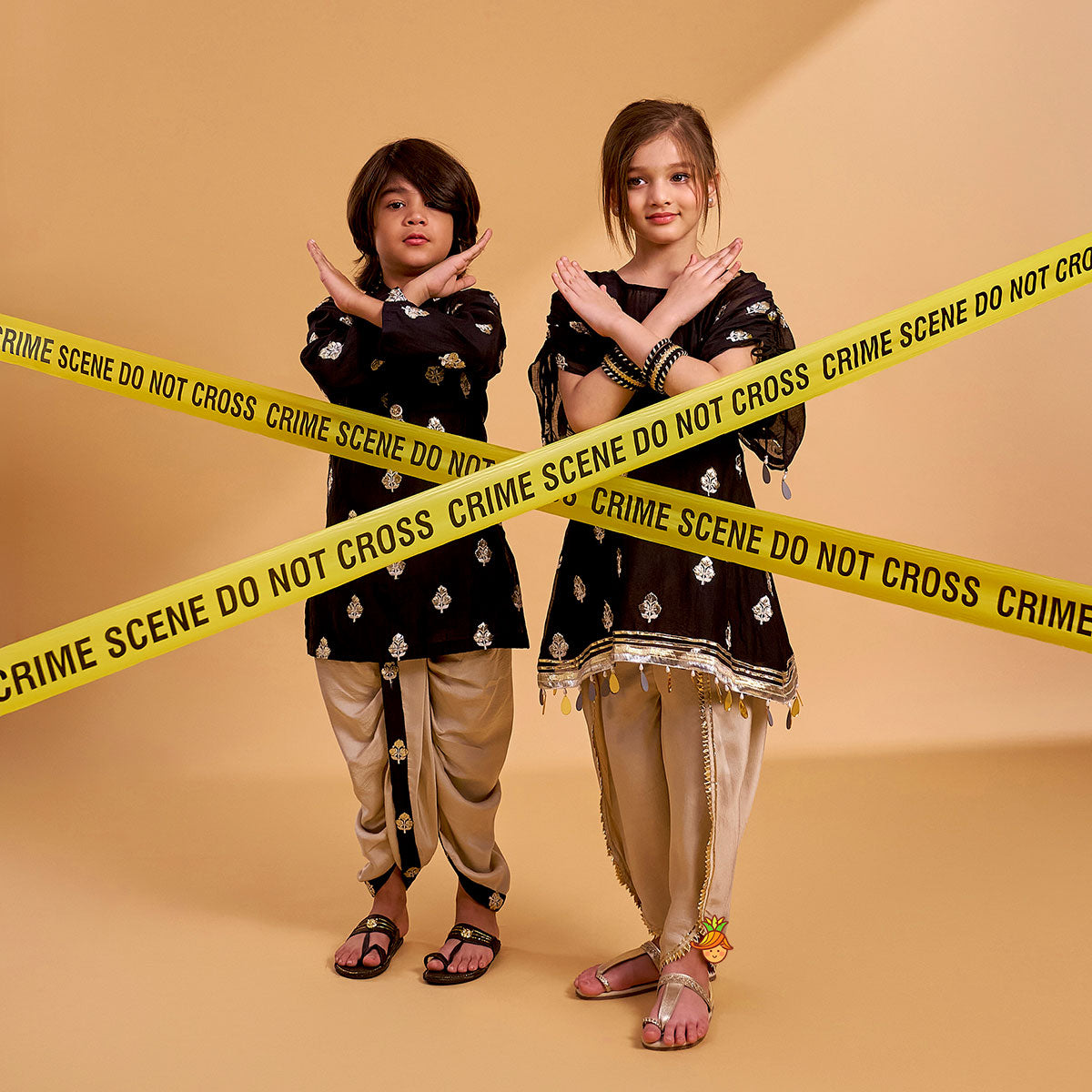 Embroidered Black Kurta And Beige Dhoti twinning model image 1