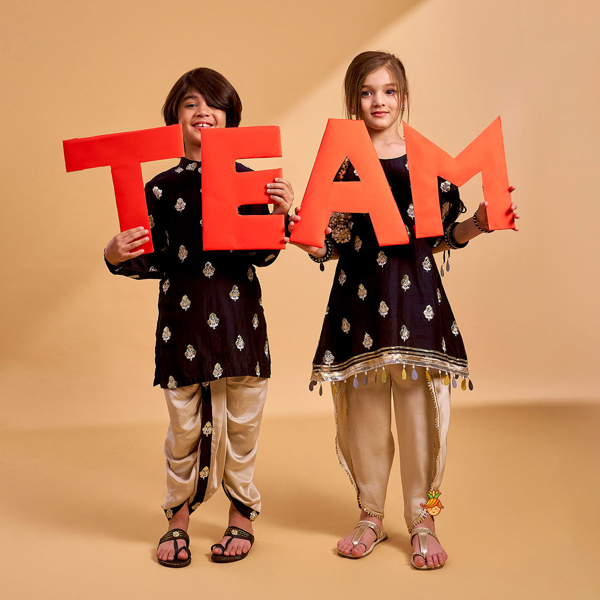 Embroidered Black Kurta And Beige Dhoti twinning model image 2