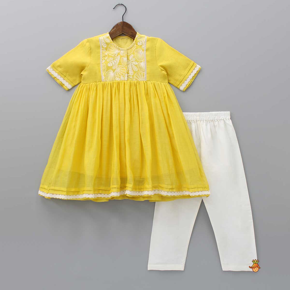 Thread Embroidered Yoke Kurti And Off White Pant
