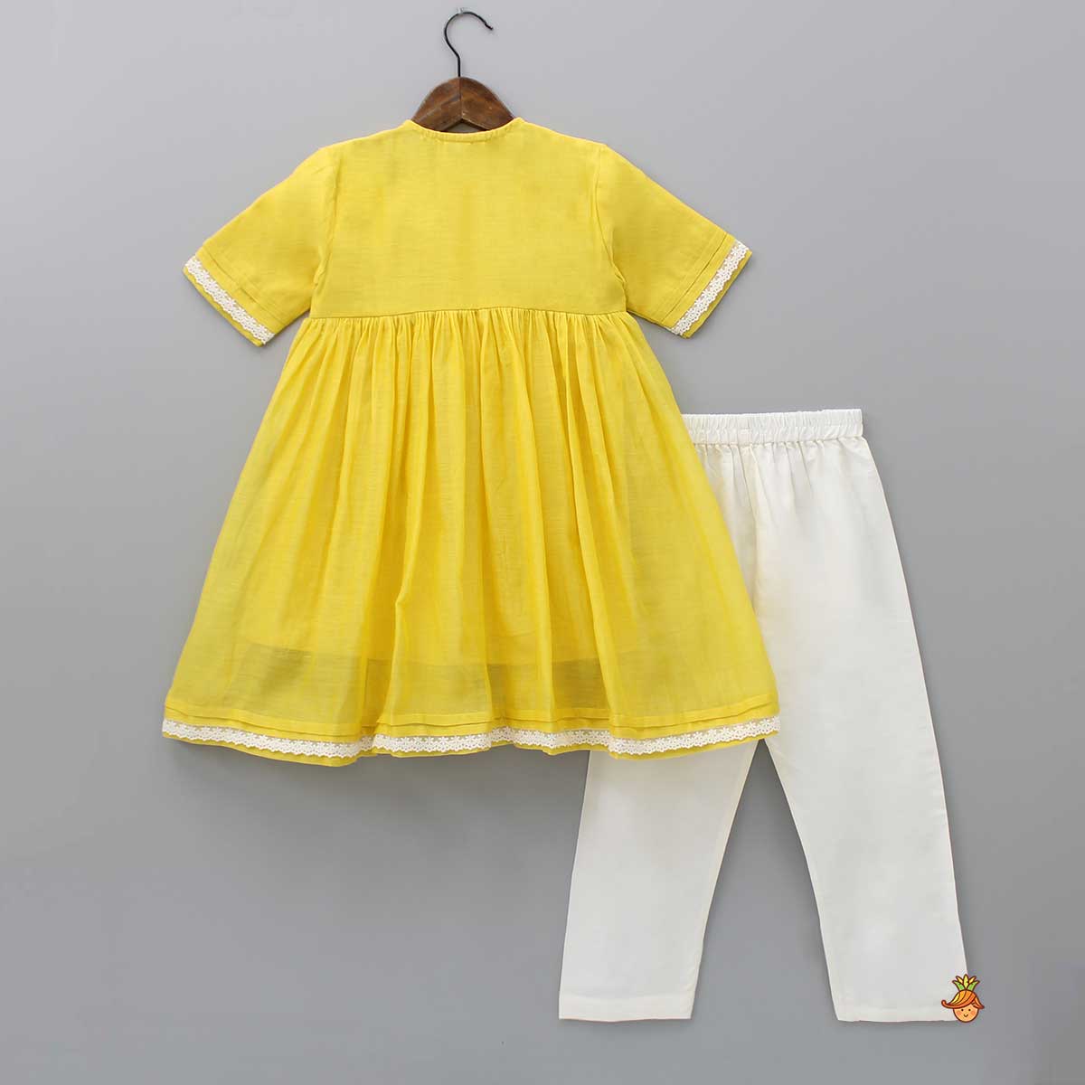 Thread Embroidered Yoke Kurti And Off White Pant