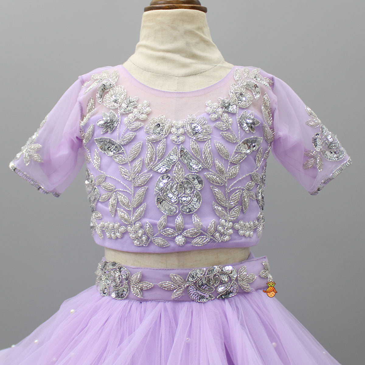 Lilac Embroidered Crop Top And Net Layered Lehenga