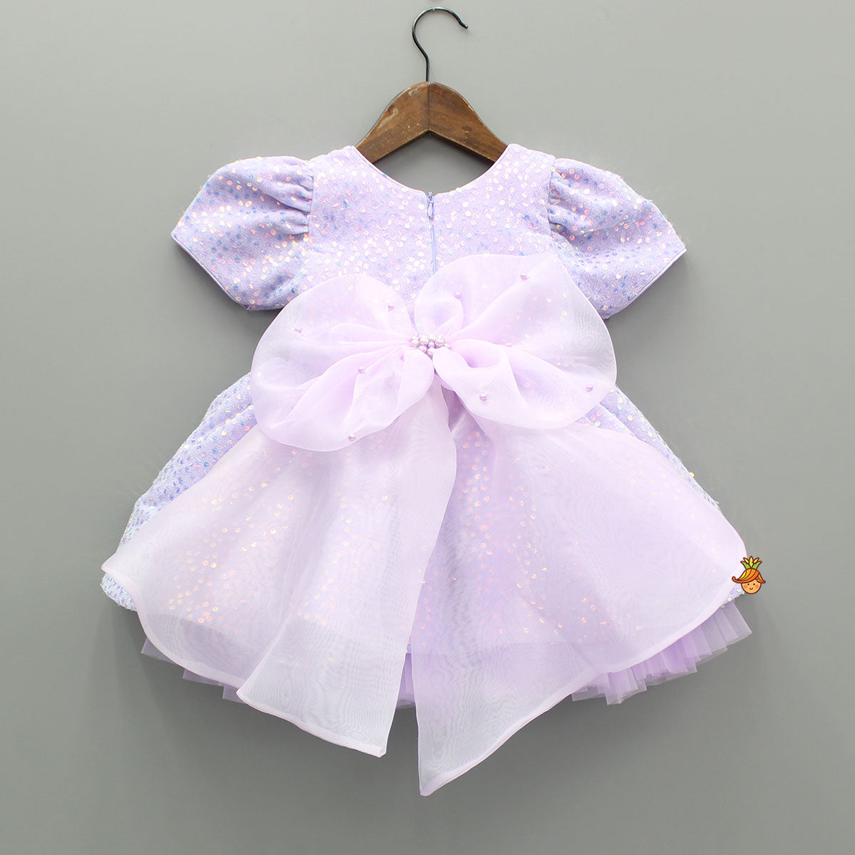 Purple Sequin Dress Adorned With Matching Bows