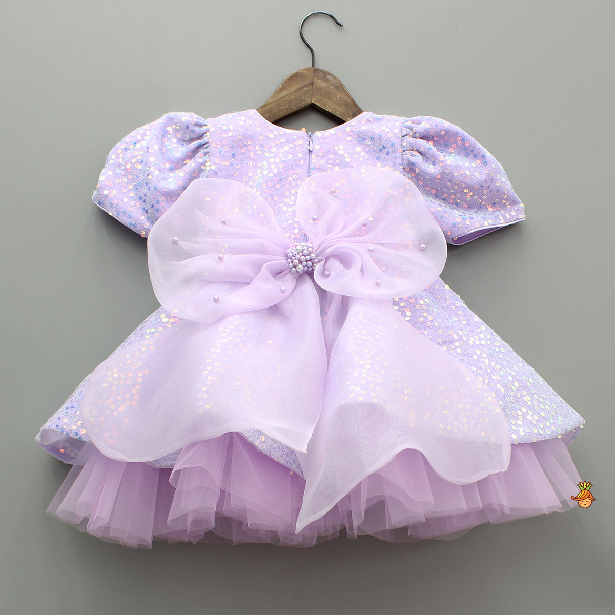 Purple Sequin Dress Adorned With Matching Bows