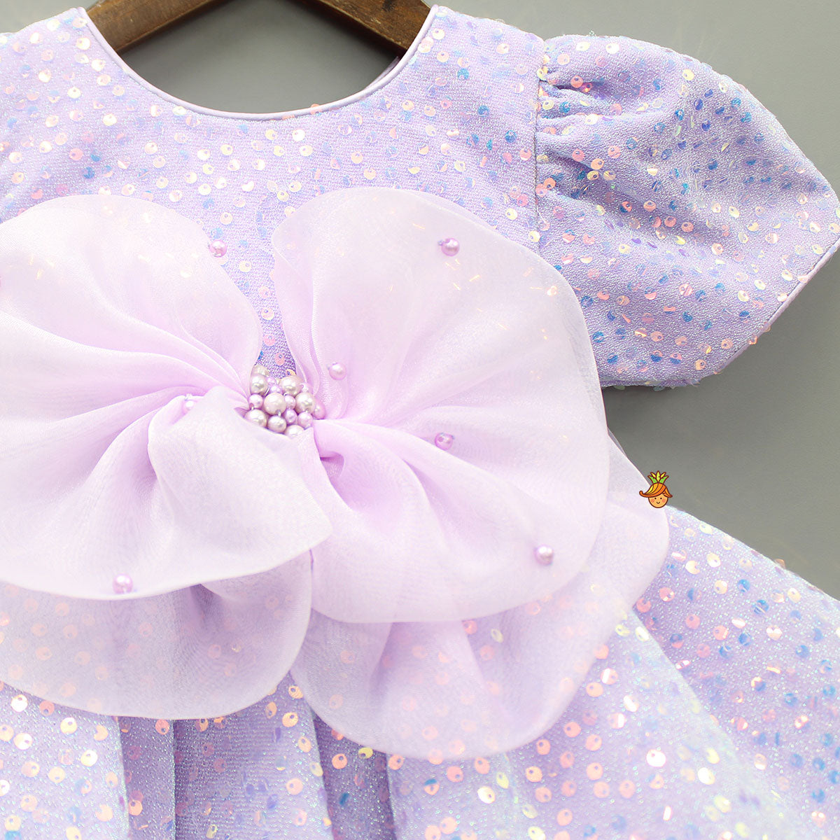 Purple Sequin Dress Adorned With Matching Bows